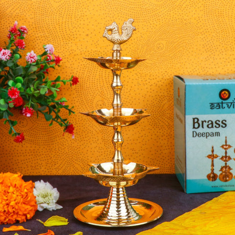 Image Alt Text:
Brass 3 Step Peacock Kerala Diya – Beautiful multi-tier brass diya with elegant peacock design, perfect for temple rituals and pooja décor. India’s Largest Pooja Accessories Brand – www.satvikstore.in
