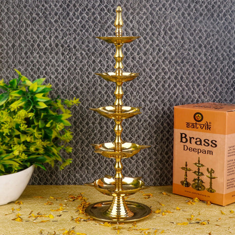 Brass 5 Step Kerala Inauguration Diya – Majestic five-tiered brass lamp designed for temple use, pooja rituals, and inaugurations, radiating divine grace. India’s Largest Pooja Accessories Brand – www.satvikstore.in