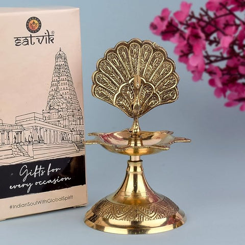 Handcrafted Brass Flying Peacock Kerala Samai Deepam Puja Diya – Traditional tall brass oil lamp with a majestic flying peacock design, ideal for temple rituals and festive home decor. India’s Largest Pooja Accessories Brand – www.satvikworld.com
