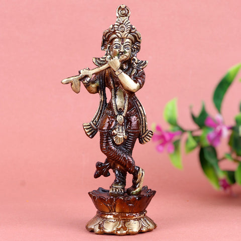 Brass Krishna idol, finely crafted to depict Lord Krishna in a divine pose, holding his flute and symbolizing love, devotion, and spiritual harmony. Ideal for home temples, gifting, or as a decorative piece. India’s Largest Pooja Accessories Brand – www.satvikworld.com
