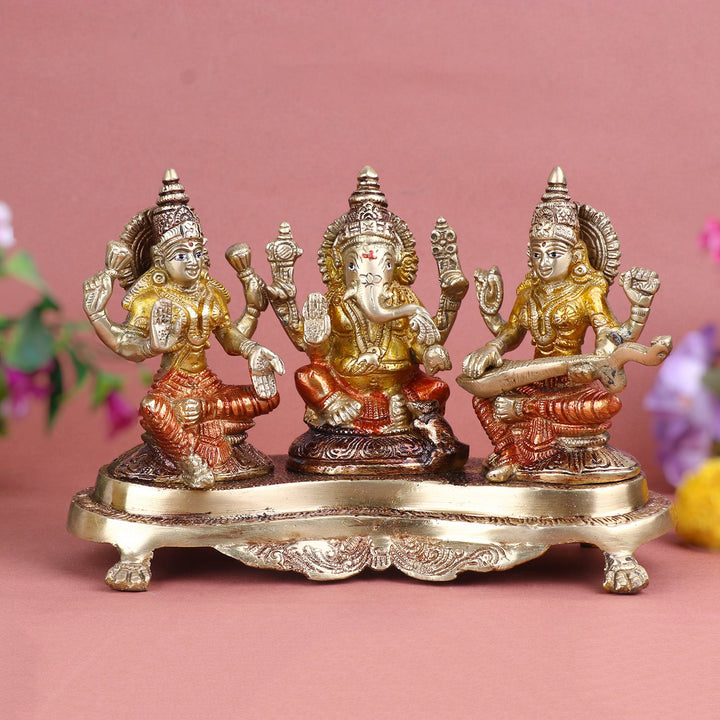 Brass Lakshmi Ganesh with Sarasvati Idol intricately crafted to symbolize wisdom, wealth, and prosperity, ideal for Diwali celebrations, home mandirs, and spiritual gifting. India’s Largest Pooja Accessories Brand – www.satvikworld.com