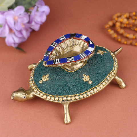 Brass Turtle with Diya for Pooja, a beautifully crafted piece featuring a turtle design with a diya holder, perfect for enhancing your spiritual practices and home decor. India’s Largest Pooja Accessories Brand – www.satvikworld.com