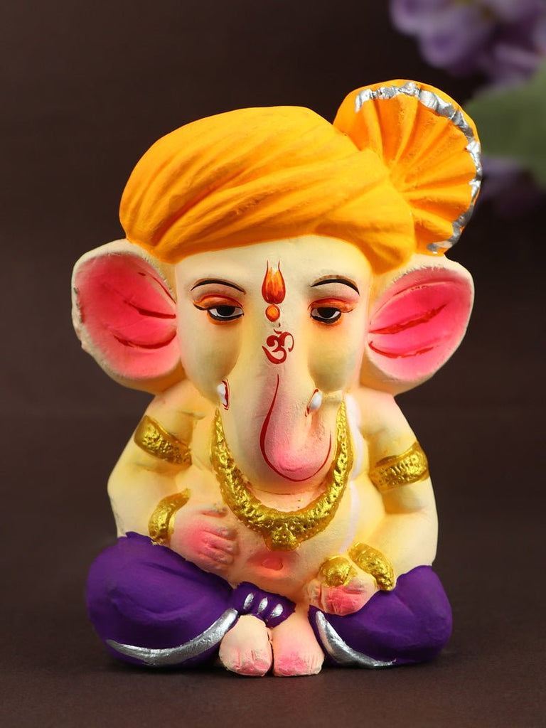 4.3 Inch Cute Eco-Friendly Bal Ganesha idol with vibrant colors and an orange pagdi, handcrafted for festive decoration and worship. India’s Largest Pooja Accessories Brand – www.satvikworld.com