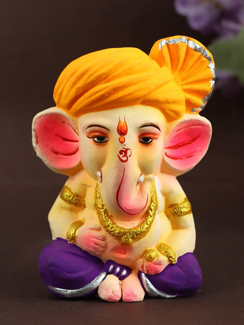 4.3 Inch Cute Eco-Friendly Bal Ganesha idol with vibrant colors and an orange pagdi, handcrafted for festive decoration and worship. India’s Largest Pooja Accessories Brand – www.satvikworld.com