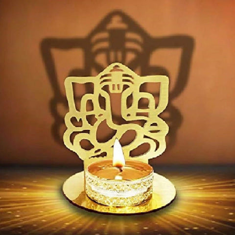 Decorative Lord Ganesha Shadow Diya crafted in metal, designed to project a divine shadow of Lord Ganesha when lit, perfect for pooja rituals and festive home décor. India’s Largest Pooja Accessories Brand – www.satvikworld.com