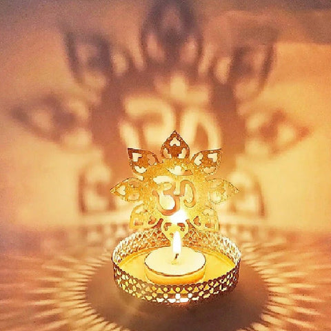 Decorative alluring OM Shadow Diya crafted from premium metal, featuring intricate OM design that creates a captivating shadow, perfect for pooja, festivals, and spiritual settings. India’s Largest Pooja Accessories Brand – www.satvikworld.com