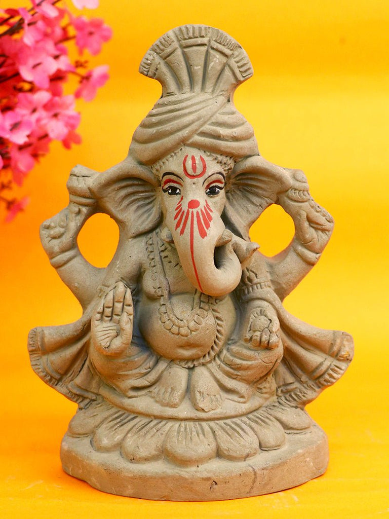 6.3 Inch Eco-Friendly Ganesha Idol wearing a traditional pagdi, seated gracefully in Padmasana pose, handcrafted from natural clay. India’s Largest Pooja Accessories Brand – www.satvikworld.com