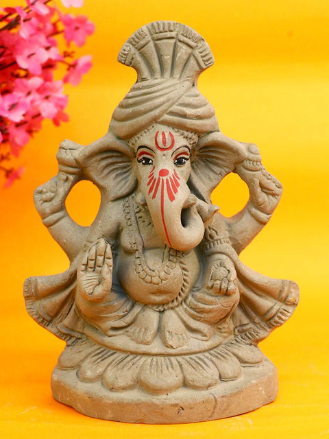 6.3 Inch Eco-Friendly Ganesha Idol wearing a traditional pagdi, seated gracefully in Padmasana pose, handcrafted from natural clay. India’s Largest Pooja Accessories Brand – www.satvikworld.com