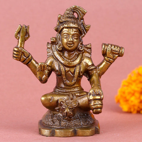 Brass Chaturbhuj Shiva Ji idol, depicting Lord Shiva with four arms, intricately crafted with divine details, symbolizing power, protection, and spiritual transcendence. Ideal for worship or spiritual décor. India’s Largest Pooja Accessories Brand – www.satvikworld.com