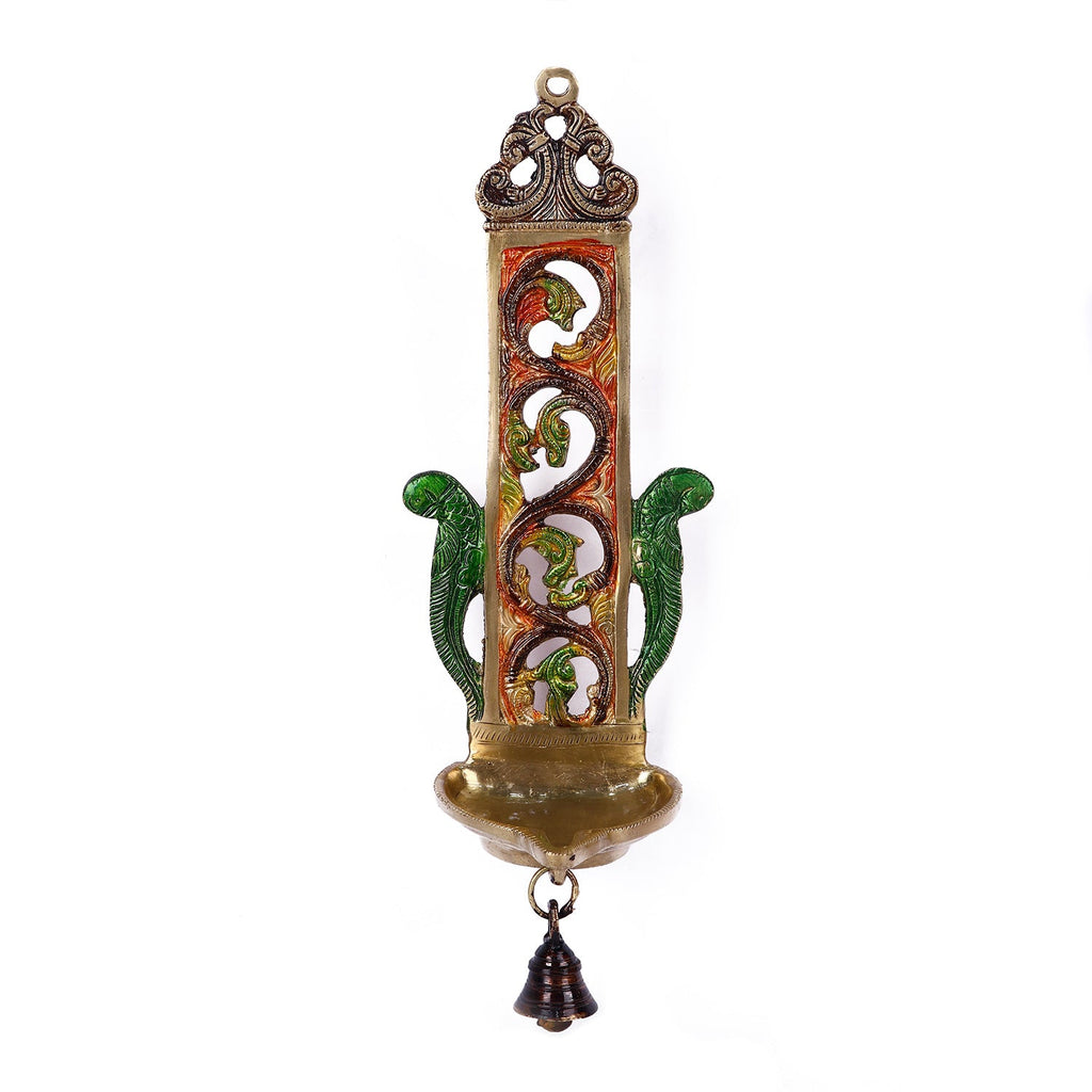 Beautifully designed wall hanging diya, crafted in brass with intricate patterns, perfect for adding an elegant touch to your home or temple décor. Ideal for lighting during festivals and spiritual ceremonies. India’s Largest Pooja Accessories Brand – www.satvikworld.com