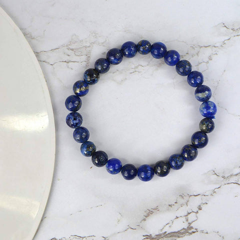 Authentic Lapis Crystal Bracelet for Reiki Healing – 8 MM Beads for Wisdom, Inner Truth, and Spiritual Awareness.    
India’s Largest Pooja Accessories Brand – www.satvikworld.com
