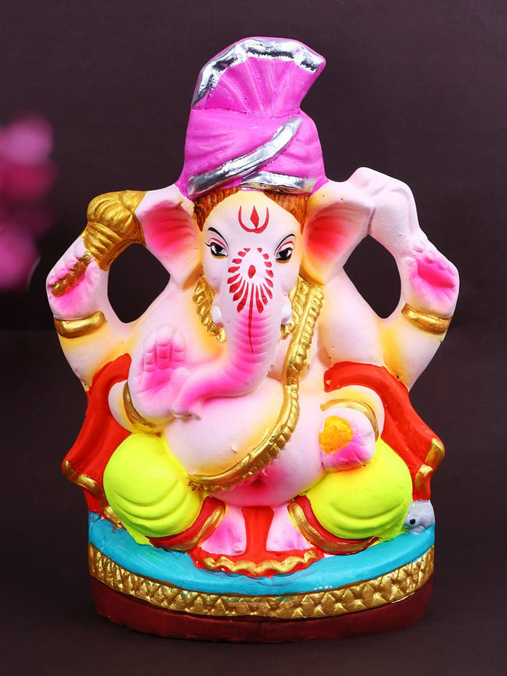 8.5-inch Nandana Eco-Friendly Ganesha idol sitting peacefully in lotus pose, made from Shadu clay and painted in festive, eco-conscious colors. India’s Largest Pooja Accessories Brand – www.satvikworld.com