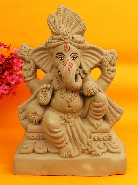 10 Inch Pramoda Eco-Friendly Ganesha Idol in majestic Raja position, crafted from natural clay with fine artistic detailing and eco-safe colors, ideal for Ganesh Chaturthi celebrations. India’s Largest Pooja Accessories Brand – www.satvikworld.com
